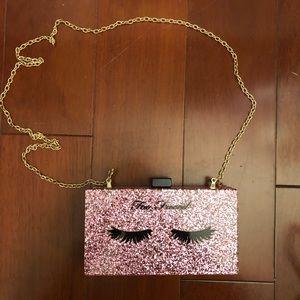 Too Faced • Glitter clutch